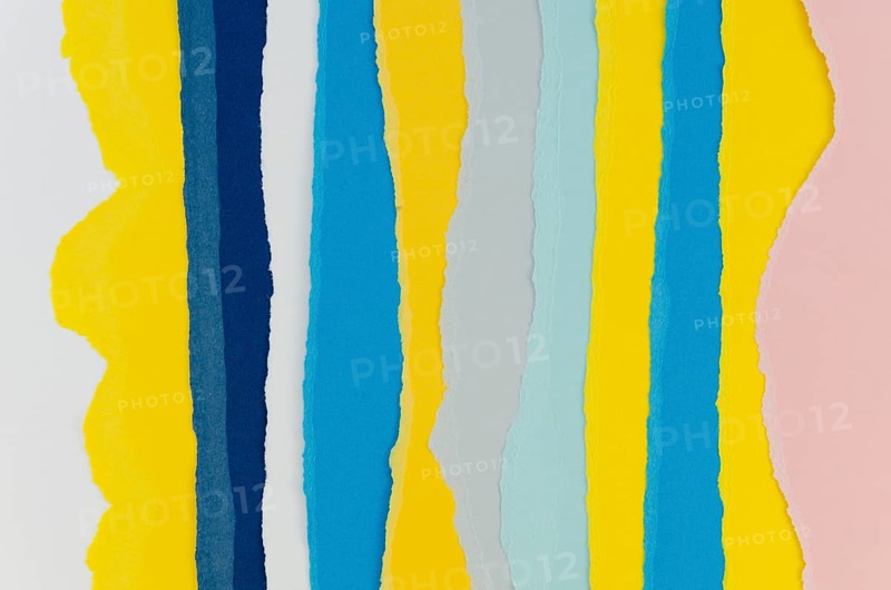 Colorful layers torn vertical papers