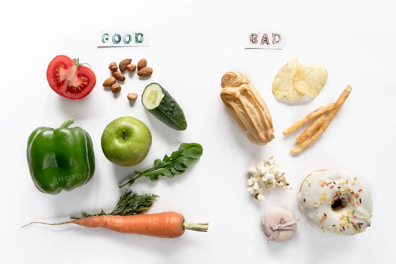 Top view good bad food isolated white background