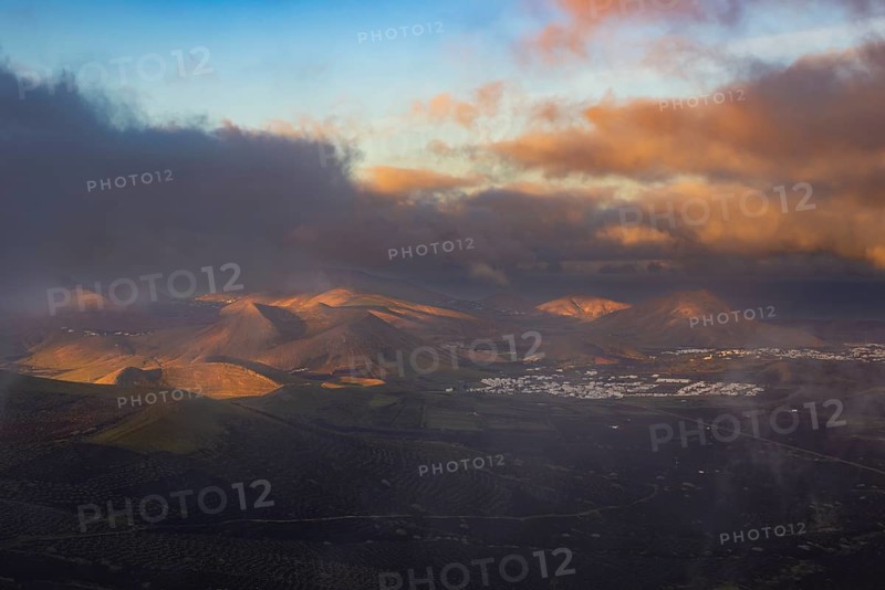 Panorama at sunrise from the Montana de Guardilama to the wine-growing area La Geria
