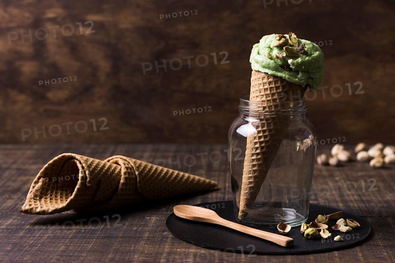Delicious ice cream cones with pistachio