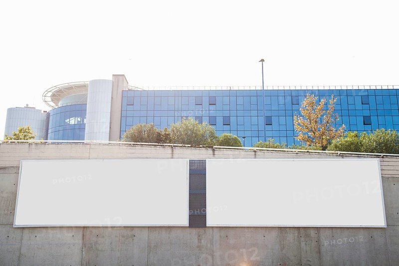 White blank billboards concrete wall front corporate building