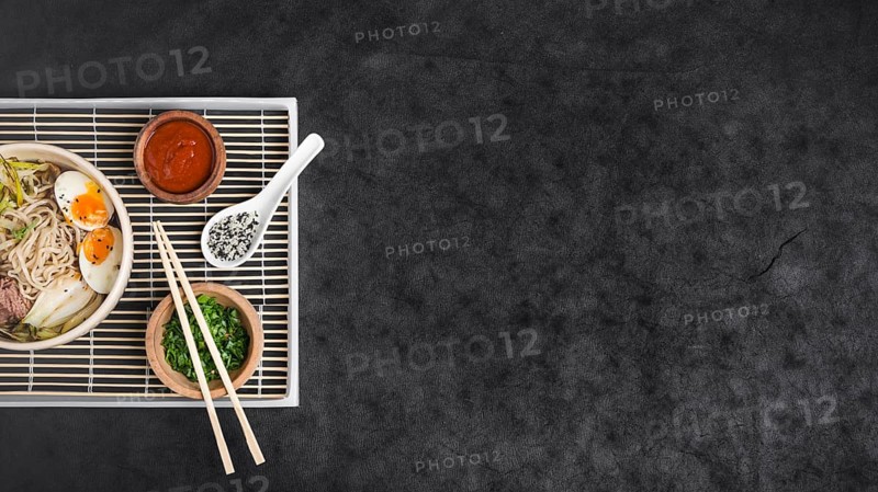 Asian ramen noodles with eggs sauces placemat
