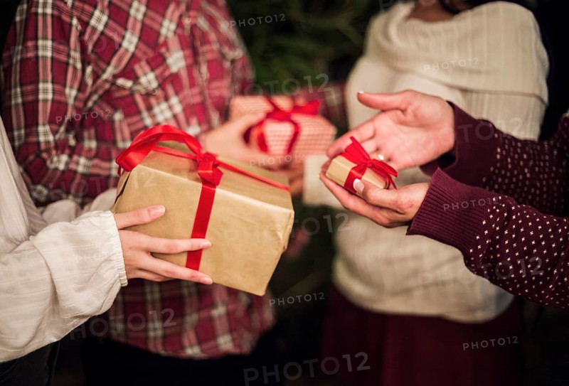 Hands people exchanging presents christmas