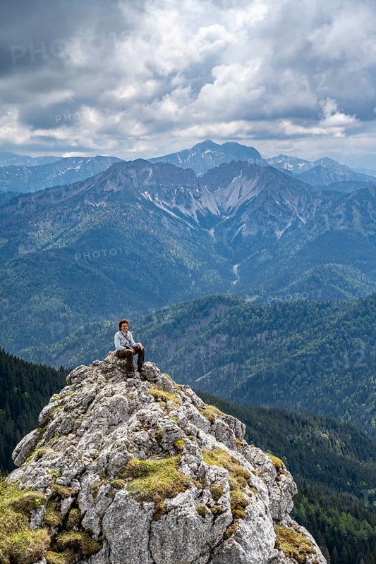 Mountaineer at the summit of Taubenstein