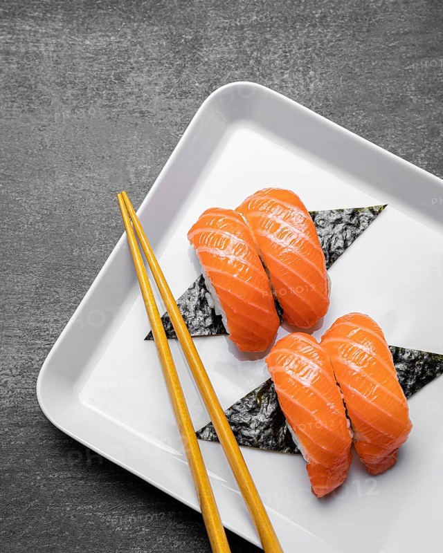Flat lay tasty sushi plate