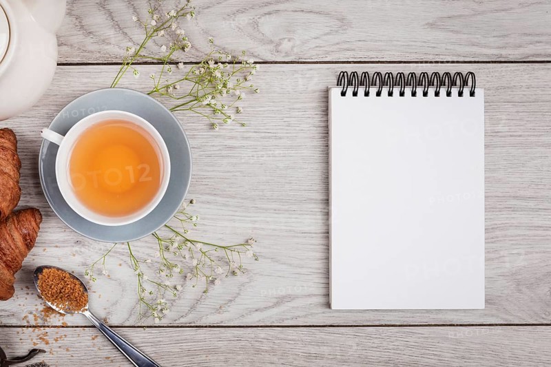 Notebook mock up wooden background