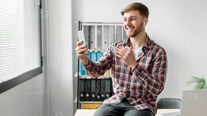 Man using mobile video call
