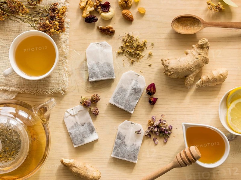 Flat lay natural medicinal herbs with tea