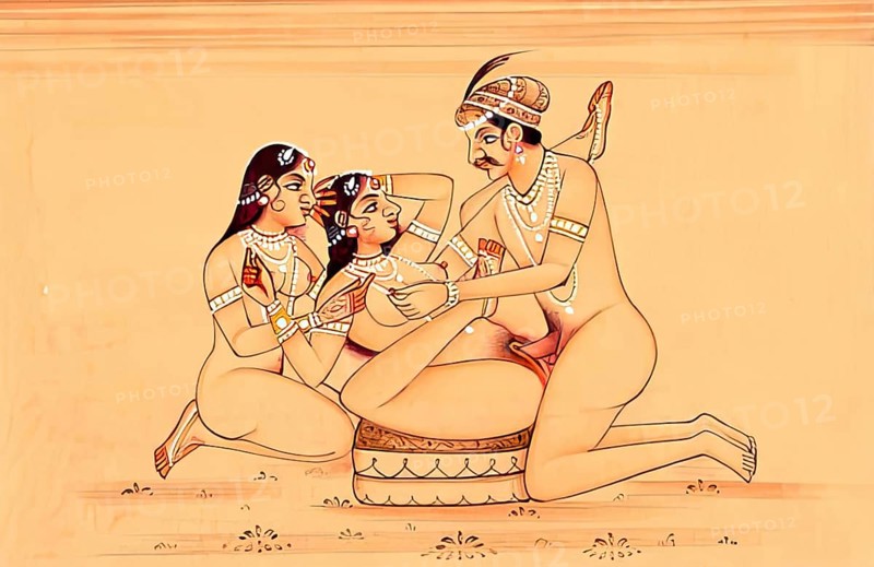 Man with two woman