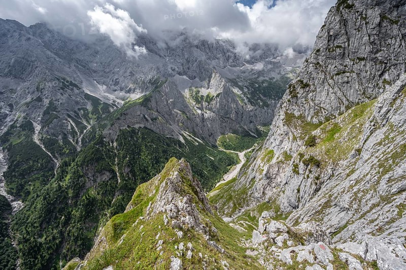 View into the Hoellental on cloudy rocky mountain landscape with Jubilaeumsgrat