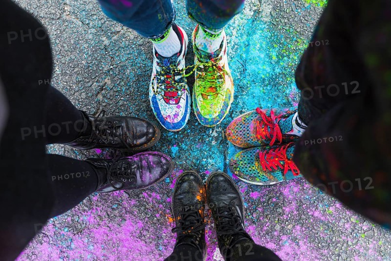Feet people standing road colorful paint
