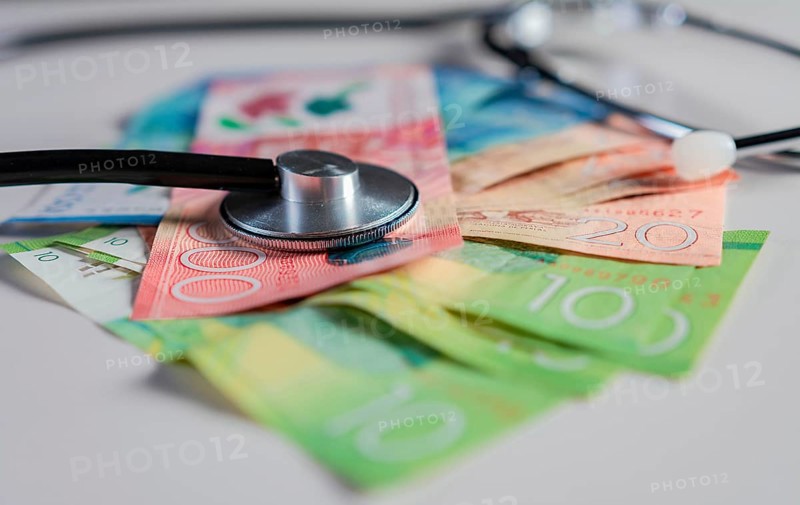Stethoscope on Nicaraguan banknotes on white background. Stethoscope on Nicaraguan banknote isolated. Nicaraguan healthcare cost concept