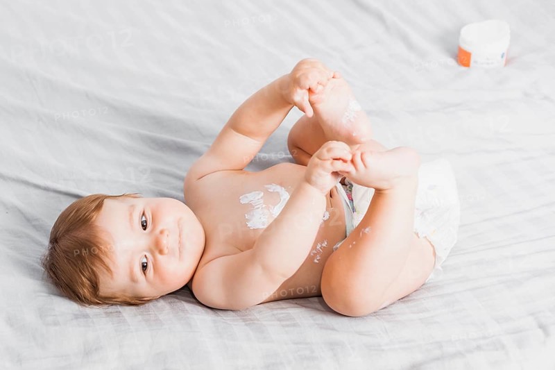 Baby spread with lotion