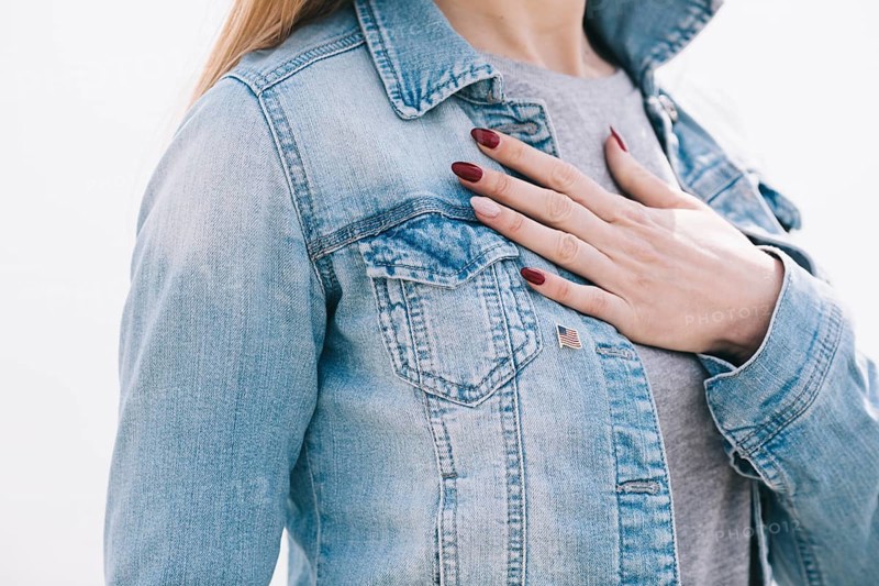 Woman with left hand chest