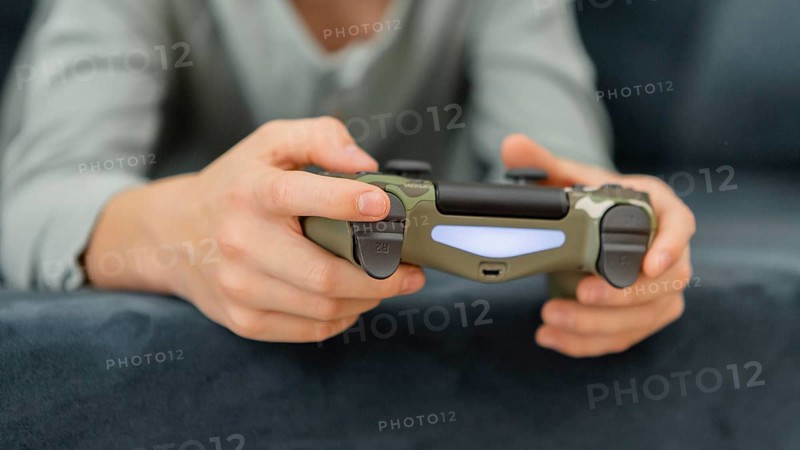 Boy playing with controller