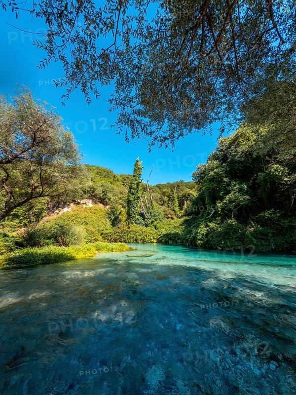 Cold waters of the river of The Blue Eye or Syri i kalter in the mountains of southern Albania
