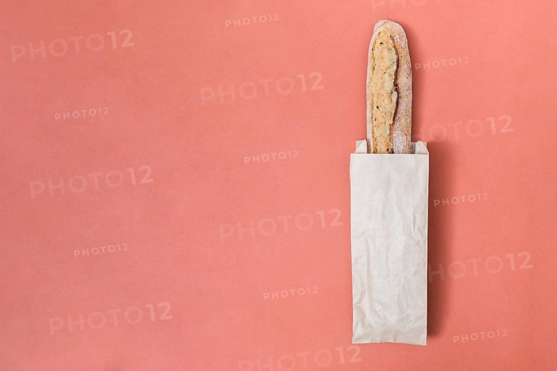 Baguette bread paper bag colored background