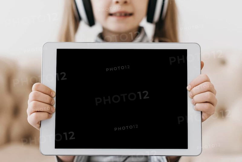 School girl copy space digital device