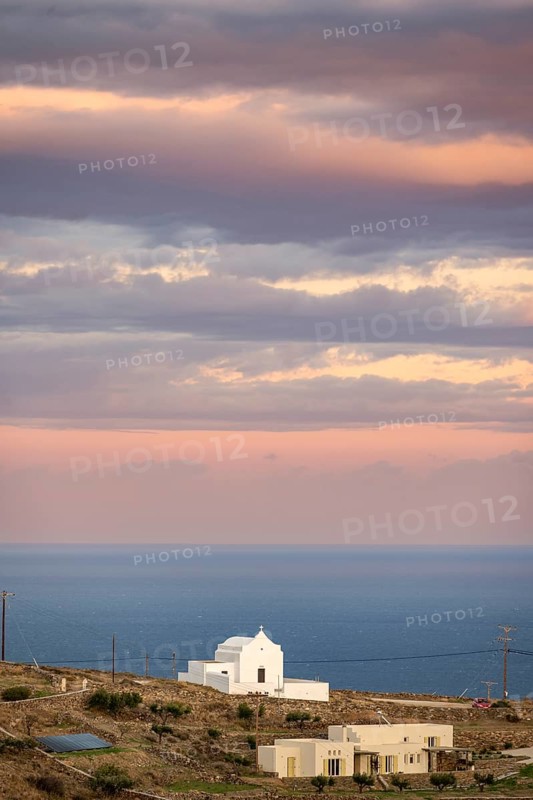 Small white chapel at sunset