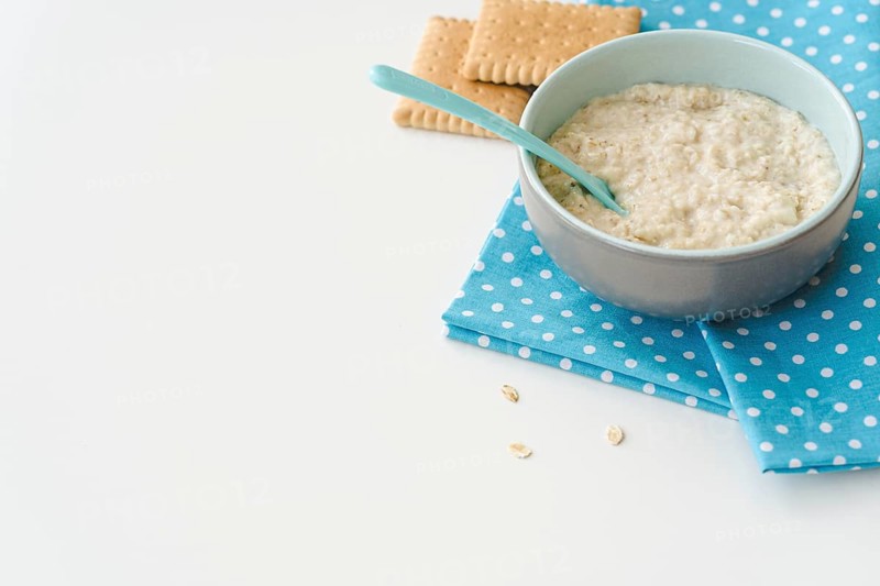 Copy space bowl with cereals biscuits