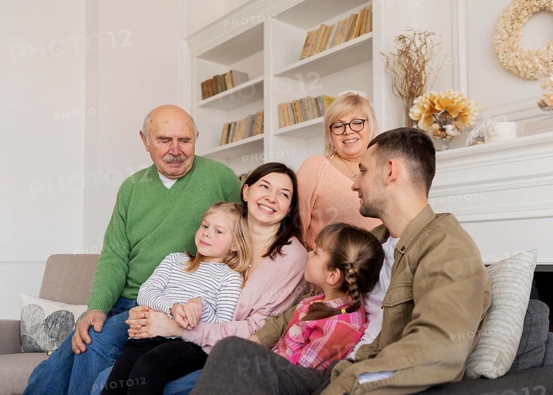 Medium shot happy family inside