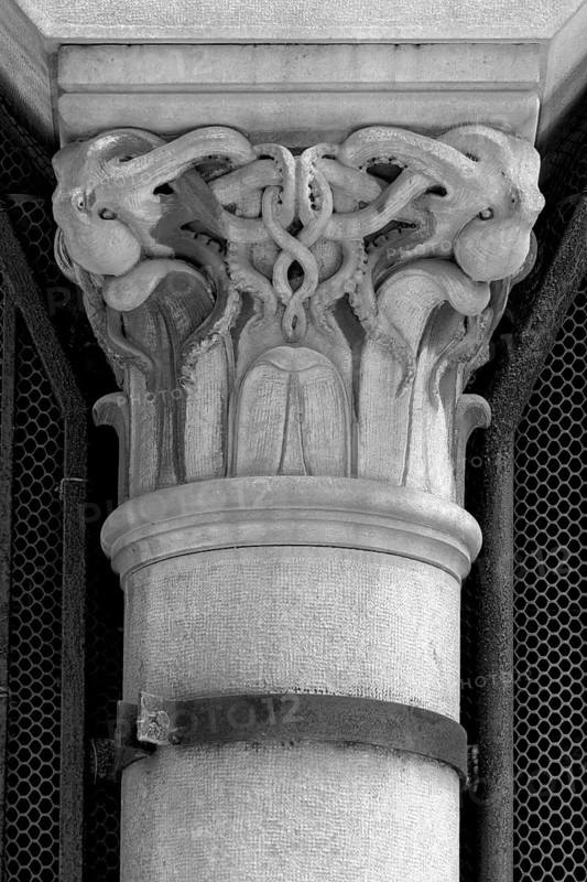 Decorative part of a supporting column with motifs of crabs