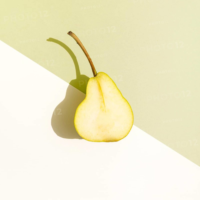 Top view half pear with shadow