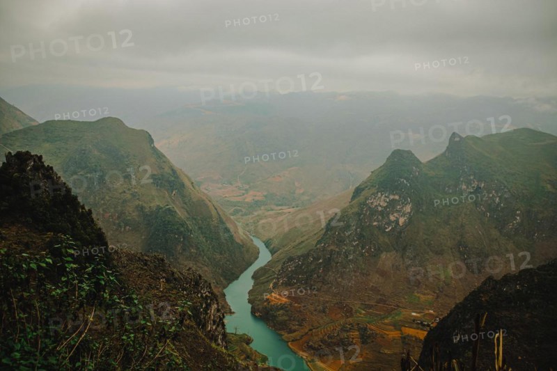 Majestic view of Nho Que River among the mountains in Dong Van