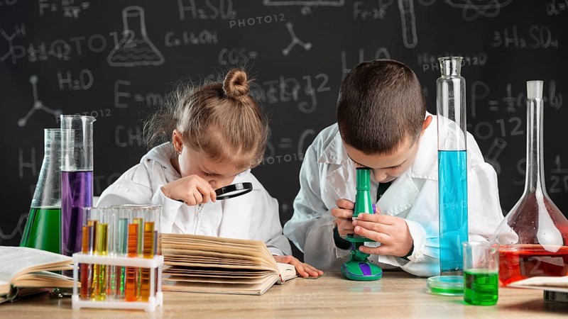 Children doing experiments laboratory