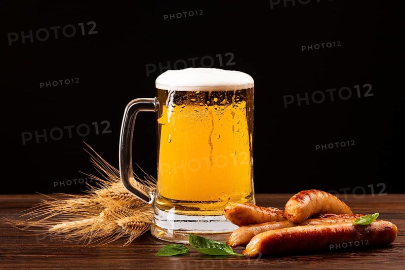 Close up beer mug with sausages
