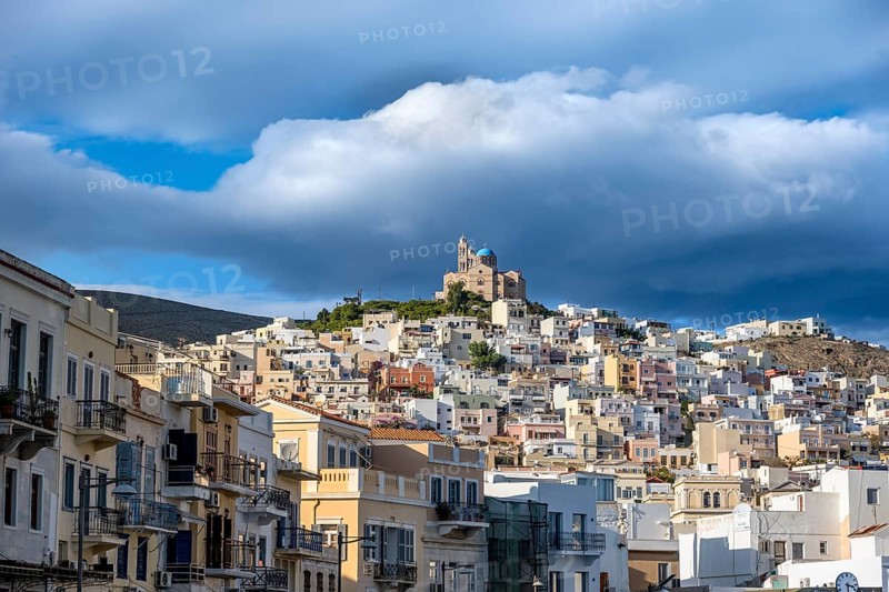 View of the town of Ermoupoli with pastel-coloured houses