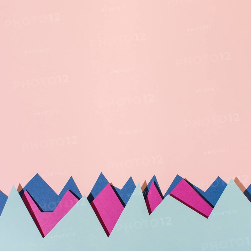Top view colorful paper pink background