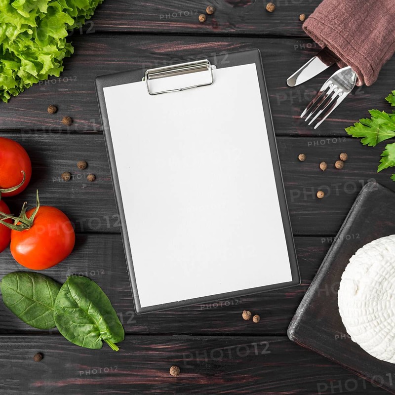 Top view empty menu with tomatoes spinach