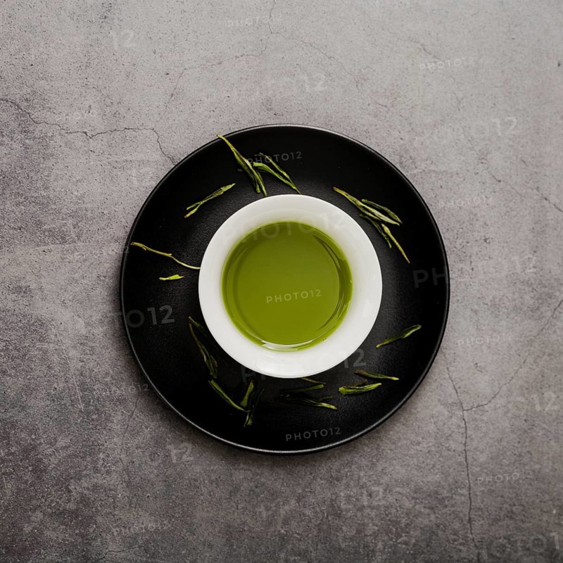 Top view cup matcha tea plate
