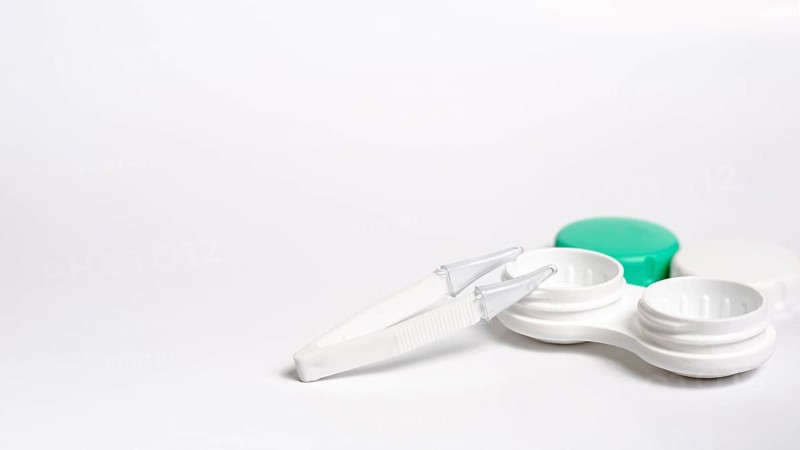 Contact lenses case with copy space tweezers