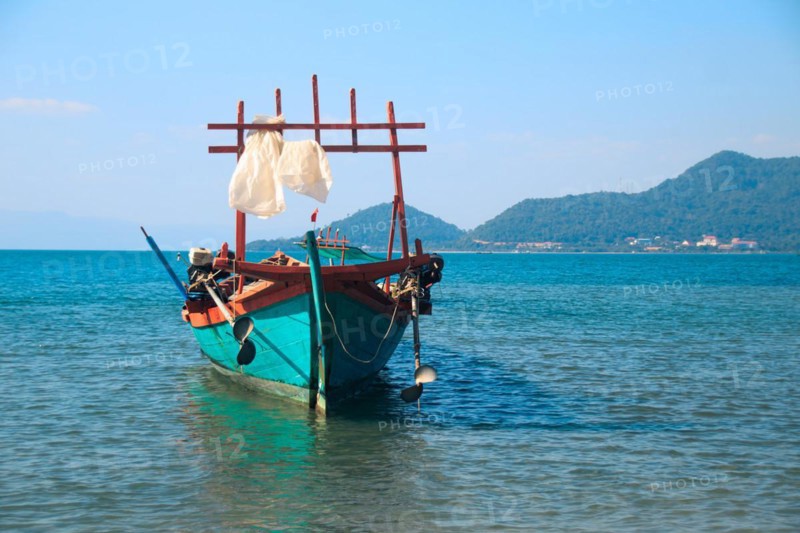 A traditional khmer fishing boat moored off the coast of Koh Tonsay or Rabbit Island in Cambodia