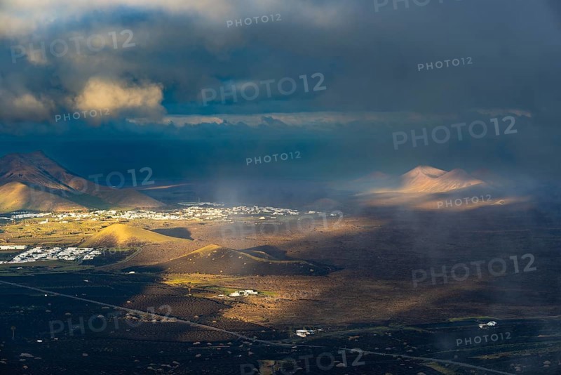 Panorama at sunrise from the Montana de Guardilama to the wine-growing area La Geria