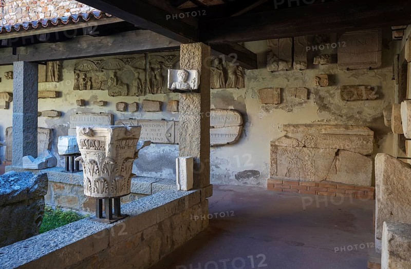 Ancient fragments of sculptures in the Grado Lapidarium