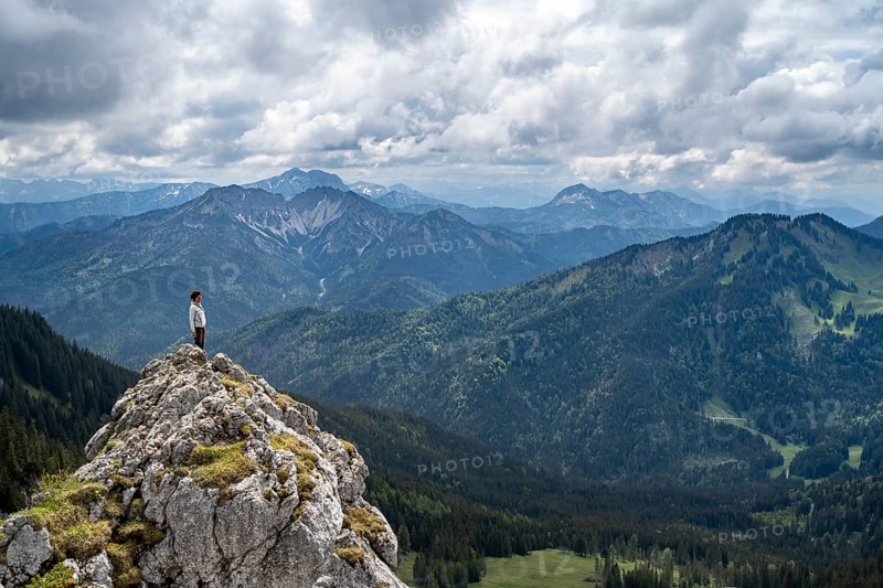 Mountaineer at the summit of Taubenstein