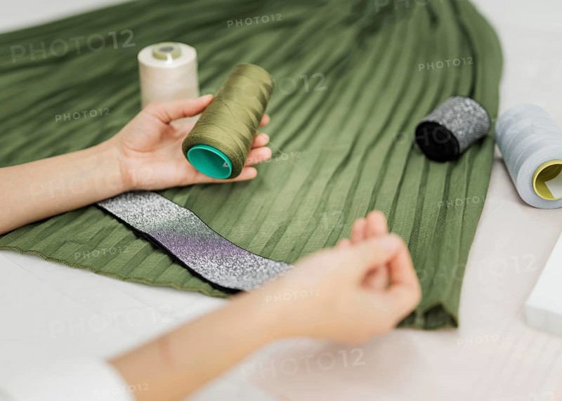 Woman sewing manual skirt