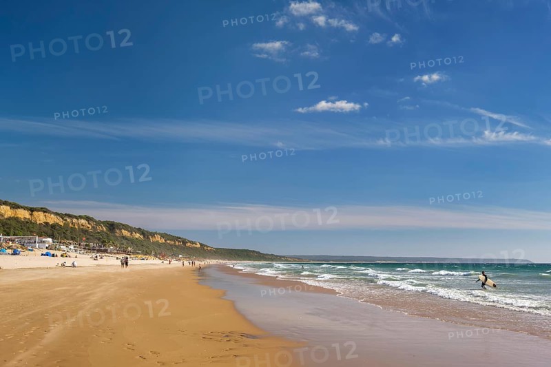 Sandy Atlantic ocean beach at Fonte da Telha beach