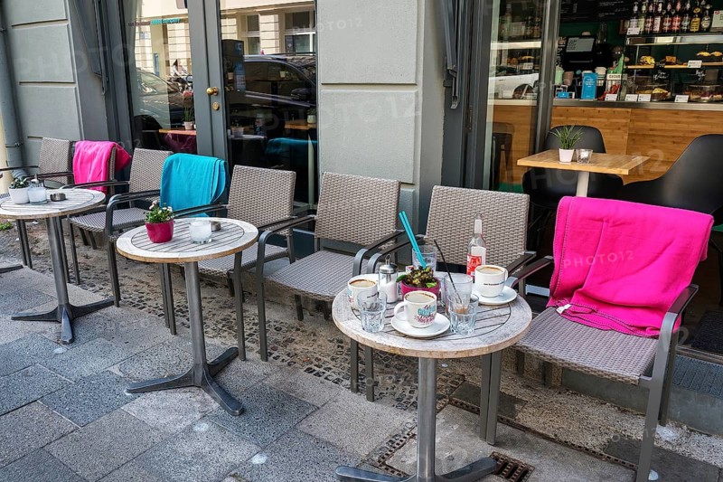 Bistro tables with colourful blankets