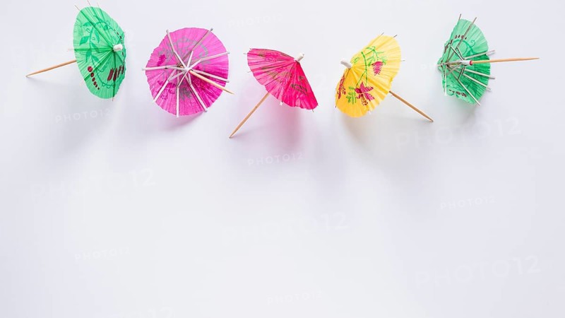 Bright cocktail umbrellas table