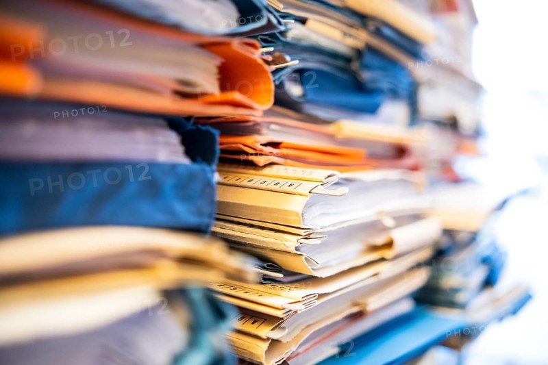A stack of court files