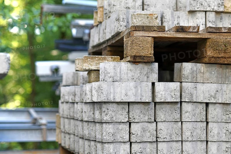 Cobble stones on palette at construction site