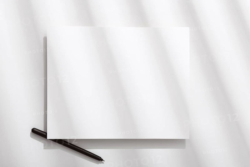 Top view blank paper with pen