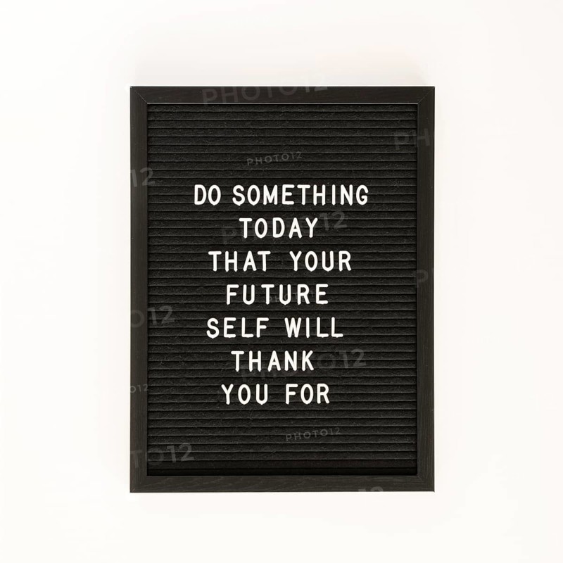 Black motivational text board top view