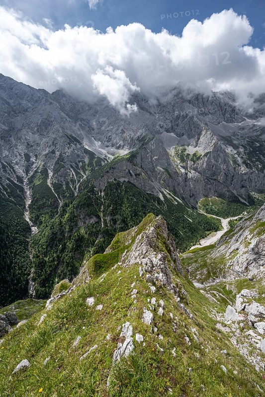 View into the Hoellental on cloudy rocky mountain landscape with Jubilaeumsgrat