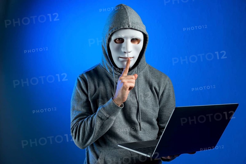 Portrait hacker with mask