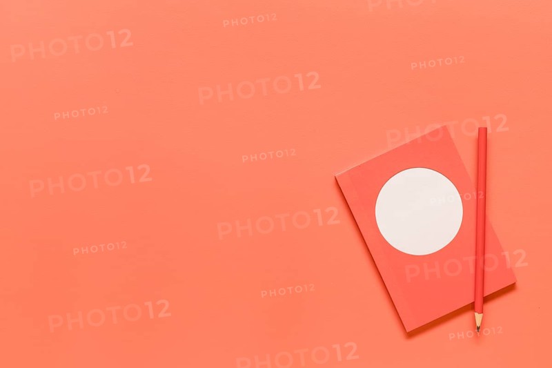 Composition pink notebook red pencil
